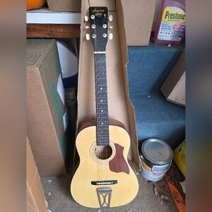 Acoustic Guitar with Natural Wood Finish